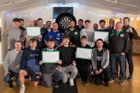 PDC World Darts Champion 2025, Luke Littler with  Tunley Athletic FC