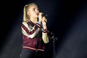 Hannah Reid of London Grammar; the Ivor Novello Award-nominated act are set to headline Latitude Festival this weekend at Henham Park, Suffolk (Credit: Getty Images)