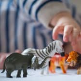 File photo dated 24/01/16 of a preschool age child playing with plastic toy animals. Blocks on childminders looking after children in their rental properties should be lifted to help boost numbers in the sector, Children's minister Claire Coutinho has told landlords. Issue date: Monday August 21, 2023.