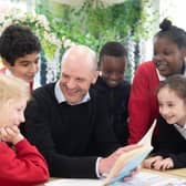 Headteacher Chris Hollands with pupils.