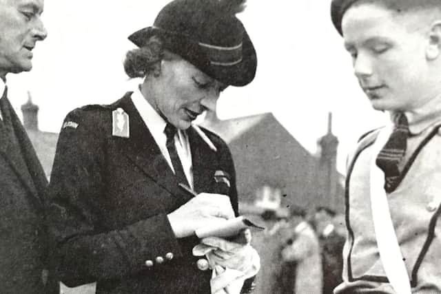Lady Mountbatten, Superintendent-in-Chief, with a St John Cadet in 1944