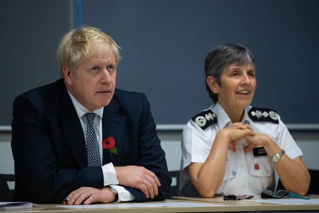 Prime Minister Boris Johnson and Police Commissioner Cressida Dick during a visit to Metropolitan Police training college in Hendon in 2019. Picture: Aaron Chown - WPA Pool/Getty Images