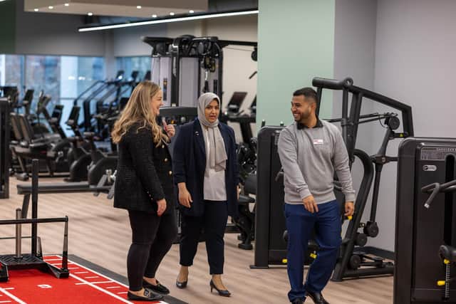 Tina Collins (left) and Hasan Romel (right) of Everyone Active show Councillor Ashraf around the upgraded facilities at Abbey Leisure Centre