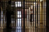 Prison Guards make last minute checks to the Woman's wing.