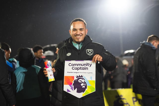 Arran Johny receiving his Community Captain Award