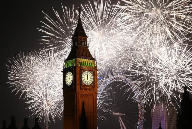 Fireworks light up the London skyline and Big Ben just after midnight on January 1, 2015