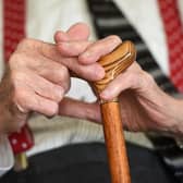 File photo dated 18/05/17 of an elderly man holding a walking stick, as three out of four care staff who look after people at home are not being paid for the time it takes them to travel between appointments, according to new research. Unison said its survey of more than 300 care workers across England revealed that employers are effectively breaking minimum wage laws, costing staff hundreds of pounds each month. Issue date: Thursday June 15, 2023.