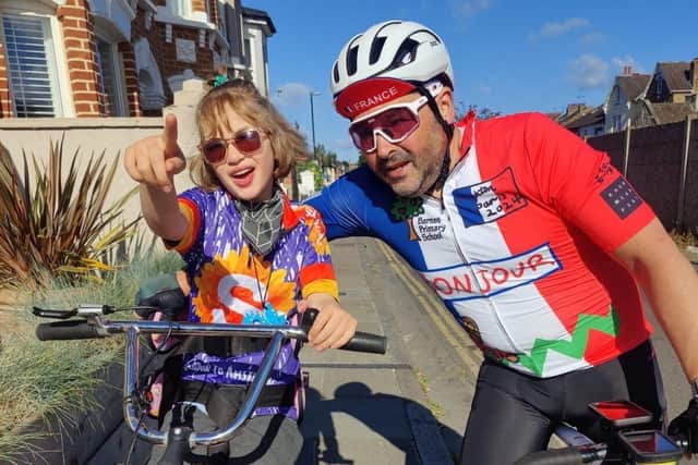 Mitch Pender, Trustee at Skylarks Charity with his daughter before he took part in the cycle ride.