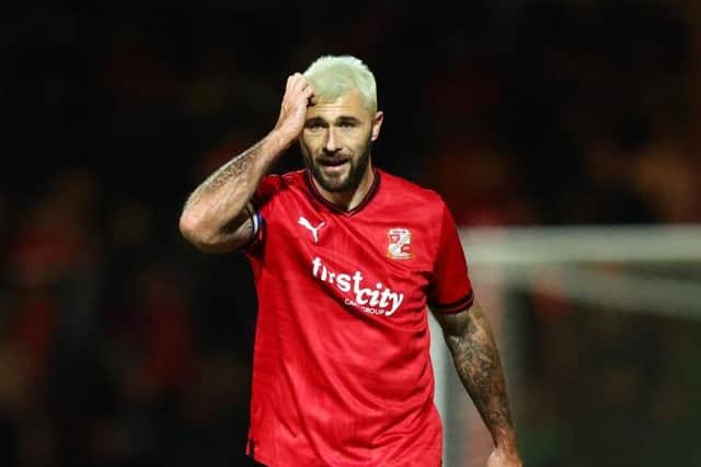 Charlie Austin in action for Swindon Town.