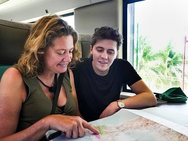 Dylan Llewellyn and mum Jackie study the map in Celebrity Race Across the World (Picture: :BBC/Studio Lambert)