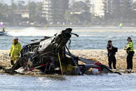 Two helicopters collided on the Australian Gold Coast, killing several passengers and critically injuring three others.