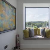 Create a cosy nook with cushions and pillows (photo: Express Bi-Folding Doors)