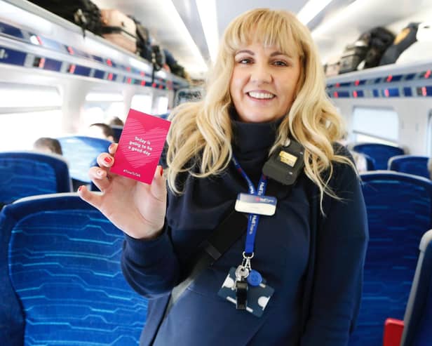 On Board Manager Amber with one of the positive affirmation cards