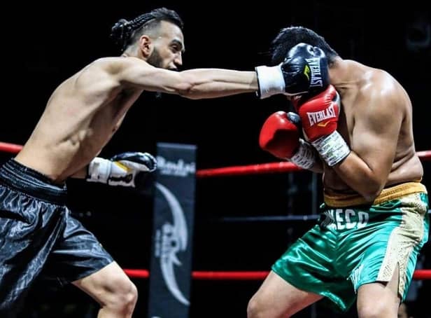Ready to return to the ring – young UK boxer squares up for his next fight.