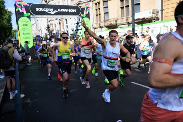 Runners cross the start line in 2024.