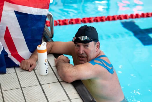 Mark O'Brien successfully completes his 50 metre Guinness World Record attempt.