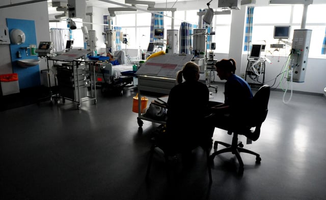 A generic stock photo of nurses on a ward at Queen Elizabeth Hospital, Birmingham.