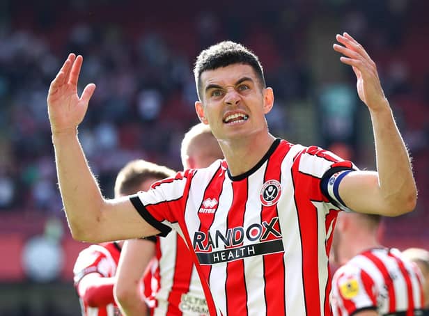 <p>SHEFFIELD, ENGLAND - AUGUST 20: John Egan of Sheffield United celebrates the third goal scored by teammate Iliman Ndiaye (Not pictured) during the Sky Bet Championship between Sheffield United and Blackburn Rovers at Bramall Lane on August 20, 2022 in Sheffield, England. (Photo by George Wood/Getty Images)</p>