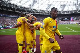 Wilfried Zaha celebrates Connor Gallagher’s equaliser at the London Stadium. (Photo by Eddie Keogh/Getty Images)