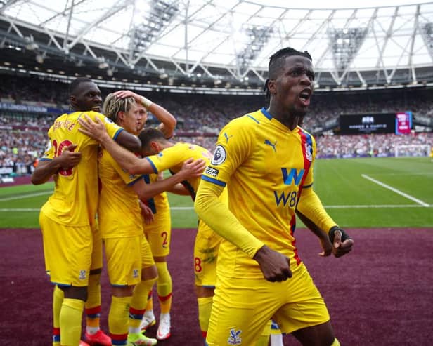 Wilfried Zaha celebrates Connor Gallagher’s equaliser at the London Stadium. (Photo by Eddie Keogh/Getty Images)