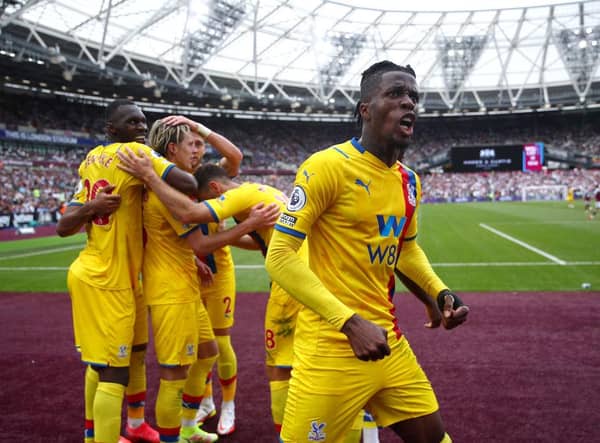 Wilfried Zaha celebrates Connor Gallagher’s equaliser at the London Stadium. (Photo by Eddie Keogh/Getty Images)