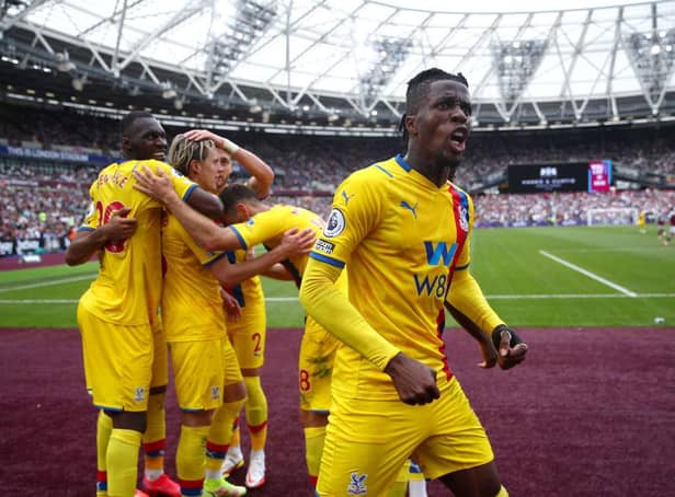 <p>Wilfried Zaha celebrates Connor Gallagher’s equaliser at the London Stadium. (Photo by Eddie Keogh/Getty Images)</p>