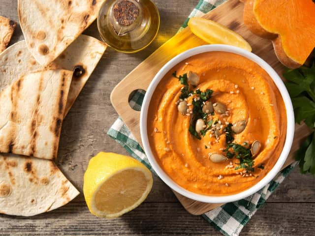 Why not try this delicious pumpkin hummus recipe? Photo credit: Getty Images/Canva Pro