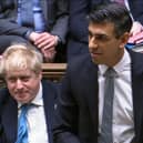 A video grab from footage broadcast by the UK Parliament's Parliamentary Recording Unit (PRU) shows Britain's Chancellor of the Exchequer Rishi Sunak gesturing as he presents the Spring budget statement to MPs at the House of Commons, in London, on March 23, 2022.  (Photo by -/PRU/AFP via Getty Images)