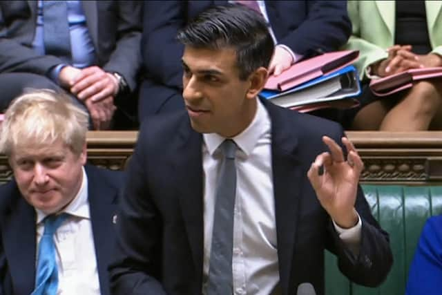 A video grab from footage broadcast by the UK Parliament's Parliamentary Recording Unit (PRU) shows Britain's Chancellor of the Exchequer Rishi Sunak gesturing as he presents the Spring budget statement to MPs at the House of Commons, in London, on March 23, 2022. (Photo by PRU / AFP) / RESTRICTED TO EDITORIAL USE - MANDATORY CREDIT "AFP PHOTO / PRU " - NO MARKETING - NO ADVERTISING CAMPAIGNS - DISTRIBUTED AS A SERVICE TO CLIENTS (Photo by -/PRU/AFP via Getty Images)