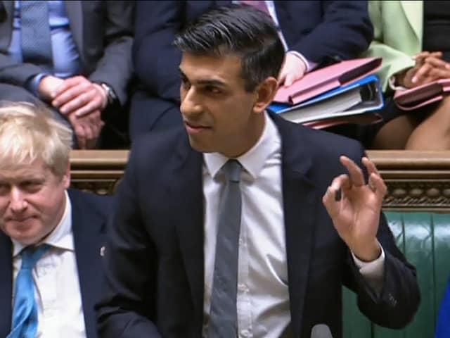 A video grab from footage broadcast by the UK Parliament's Parliamentary Recording Unit (PRU) shows Britain's Chancellor of the Exchequer Rishi Sunak gesturing as he presents the Spring budget statement to MPs at the House of Commons, in London, on March 23, 2022.  (Photo by -/PRU/AFP via Getty Images)