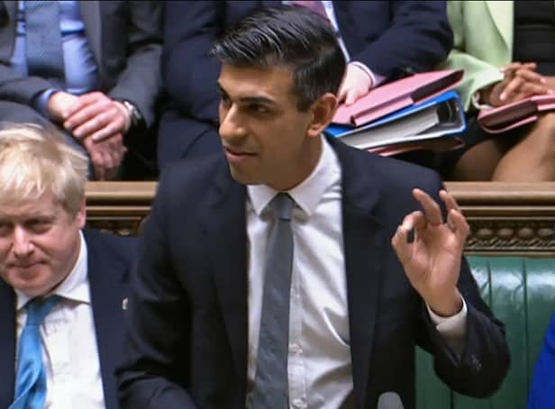 A video grab from footage broadcast by the UK Parliament's Parliamentary Recording Unit (PRU) shows Britain's Chancellor of the Exchequer Rishi Sunak gesturing as he presents the Spring budget statement to MPs at the House of Commons, in London, on March 23, 2022.  (Photo by -/PRU/AFP via Getty Images)