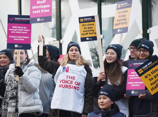 Nurses braving freezing temperatures to form a picket line.