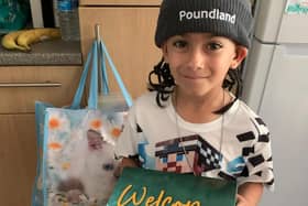 Rohan with his box of Poundland goodies and Poundland hat