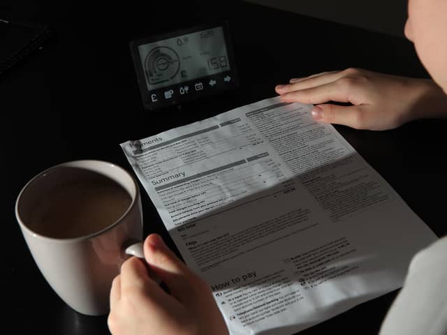 A smart meter next to an energy bill. Picture: Peter Byrne/PA Wire
