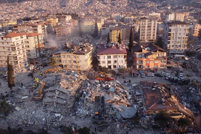 An aerial photo shows collapsed buildings in Antakya on February 11, 2023, after a 7.8-magnitude earthquake struck the country's southeast (Photo by Hassan AYADI / AFP) (Photo by HASSAN AYADI/AFP via Getty Images)