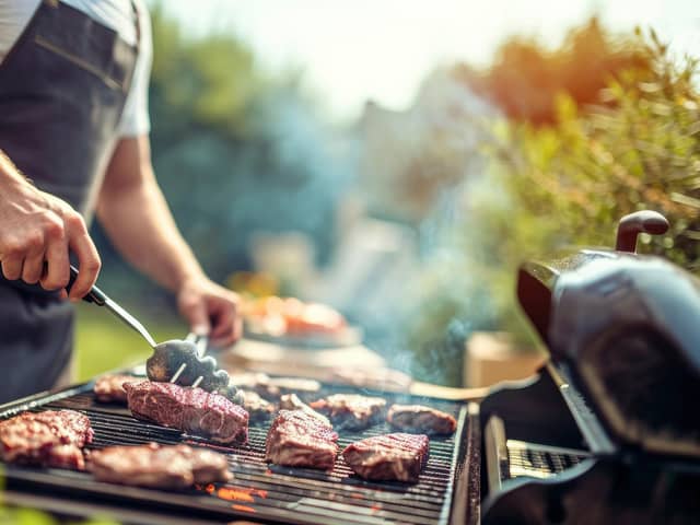 Dads just love cooking up a treat on a barbecue