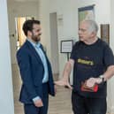 MP Bobby Dean with Button House resident Ian Jones