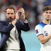 DOHA, QATAR - NOVEMBER 21: Gareth Southgate and John Stones of England applauds the fans after their sides victory during the FIFA World Cup Qatar 2022 Group B match between England and IR Iran at Khalifa International Stadium on November 21, 2022 in Doha, Qatar. (Photo by Richard Heathcote/Getty Images)