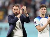 DOHA, QATAR - NOVEMBER 21: Gareth Southgate and John Stones of England applauds the fans after their sides victory during the FIFA World Cup Qatar 2022 Group B match between England and IR Iran at Khalifa International Stadium on November 21, 2022 in Doha, Qatar. (Photo by Richard Heathcote/Getty Images)