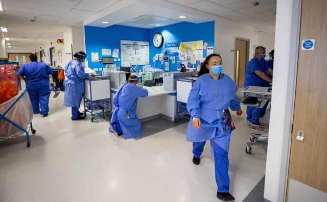 File photo dated 20/10/20 of staff on a hospital ward. More than two out of three NHS workers have considered quitting in the past six months, a new study suggests. Issue date: Thursday January 27, 2022.