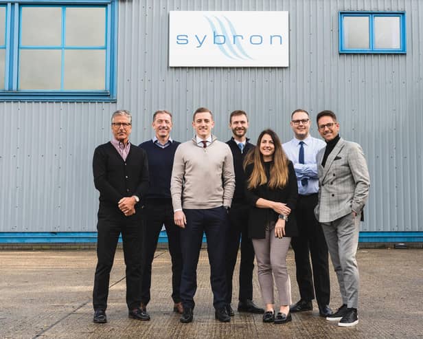 L-R Sybron co-founder, Stephen Henwood; co-founder, Trevor Henwood; MBO team: operations director, Bradley Henwood; sales & marketing director, George Mason; executive director, Kathryn Henwood; purchasing director, Mark Newson; business development director, Chris Henwood