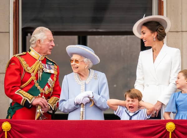 Then Prince of Wales (now King Charles III), Queen Elizabeth II, Prince Louis, the then Duchess of Cambridge (now the Princess of Wales)and Princess Charlotte on the balcony of Buckingham Palace after the Trooping the Colour ceremony at Horse Guards Parade, central London.